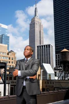 Man in suit on rooftop
