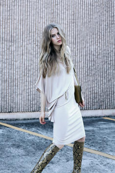 Long blond hair, cool chic look of a model on the street.