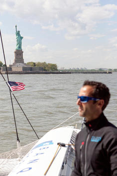 Armel Le Cl?ac\'h and the Maxi Trimaran Solo Banque Populaire VII on stand by for the multihull North Atlantic solo record attempt, New York, Manhattan, United States of America.