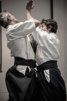 Caucasian people practicing martial arts