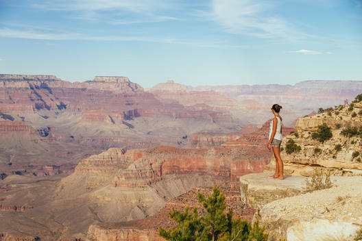 USA, Arizona, woman enjoying the view at Grand Canyon, back view