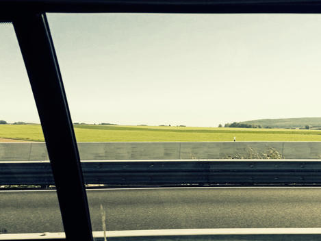 Look out of the window, car passing landscapes, Germany. Hamburg