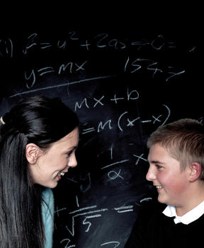 Teacher And Student Laughing Over Algebra