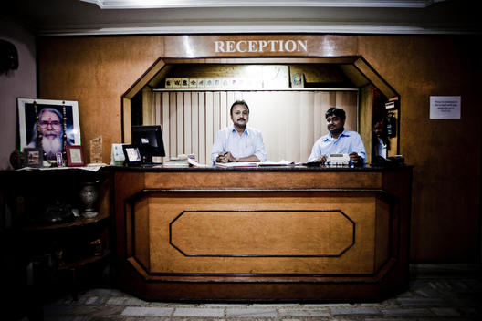 Men In Hotel Reception. Purulia, West Bengal, India.