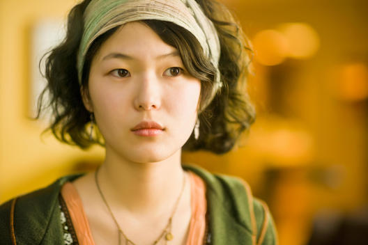 Asian woman wearing headband