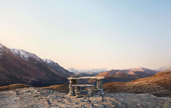 Stone desk and chair in mountains