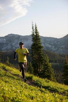 Runner on Bloods Lake trail near Guardsman Pass, Wasatch Mountains, Utah, USA