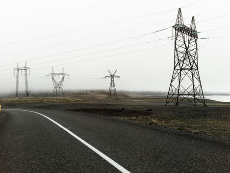 on the road ? electricity pylon next street edge in Iceland