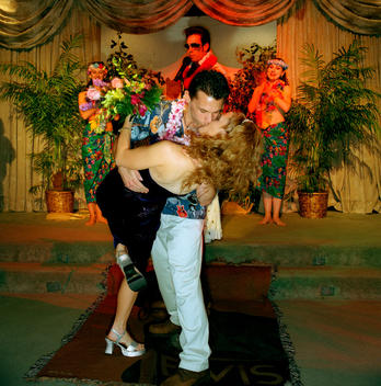 Newlyweds kiss during their \'Blue Hawaii\' wedding ceremony at the Viva Las Vegas Wedding chapel in Las Vegas on Valentines Day.