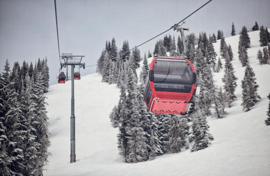 red ski gondolas at ski resort
