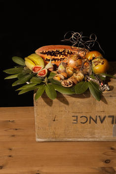 Selection Of Fruit And Vegetable On Top Of A Wooden Box