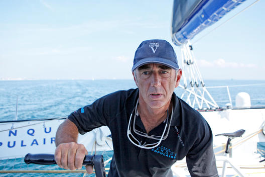 Loick Peyron onboard the Maxi Trimaran Solo Banque Populaire VII in preparation for 