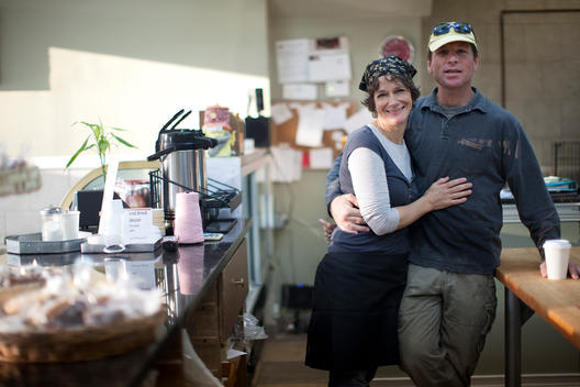 Portrait of husband and wife in their bakery