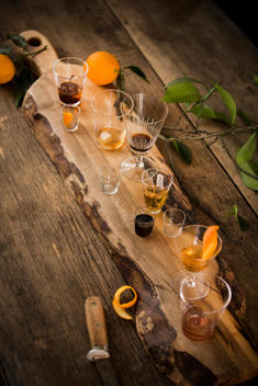 Variety of cocktails on wooden board