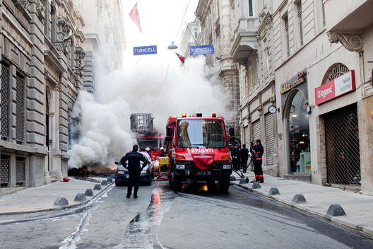 Istanbul fire fighters are trying to stop a fire on a basement of an old building where there are headquarters of many banks in the district of Beyoglu.