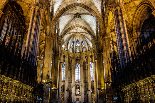 The majestic arches and columns of the Cathedral of the Holy Cross and Saint Eulalia, better known as Barcelona Cathedral in Barcelona, Spain.