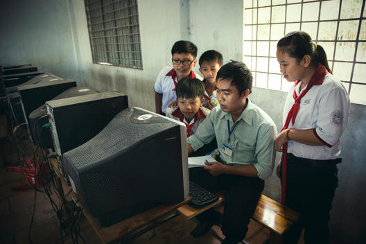 Vietnamese children and teacher in class room