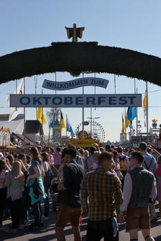 crowd at the main entrance of the famous oktoberfest in munich