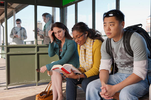 Young People Wait For A Train On A Chicago L Platform.
