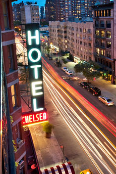Chelsea Hotel Exterior Side View At Night Wtih Neon Sign.W 23Rd Street Between 6Th And 7Th Avenues Chelsea, New York, New York.
