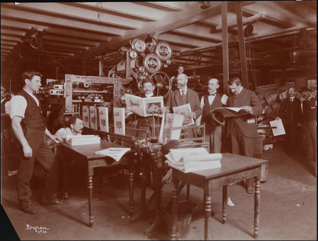 The Editorial Staff Of Success Magazine In A Printing Room Looking At Copies Of The Magazine.