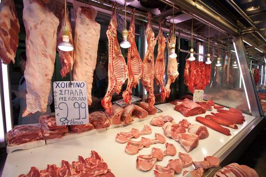 Fresh Meat Hanging From A Butcher Shop, Athens, Greece.