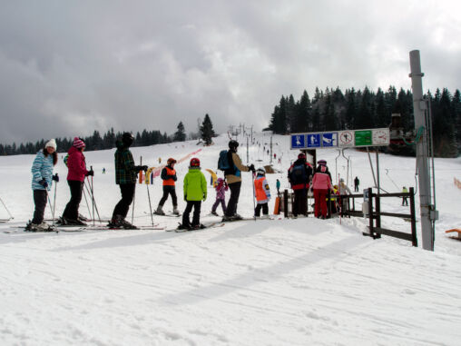 Queue of skiers at ski lift