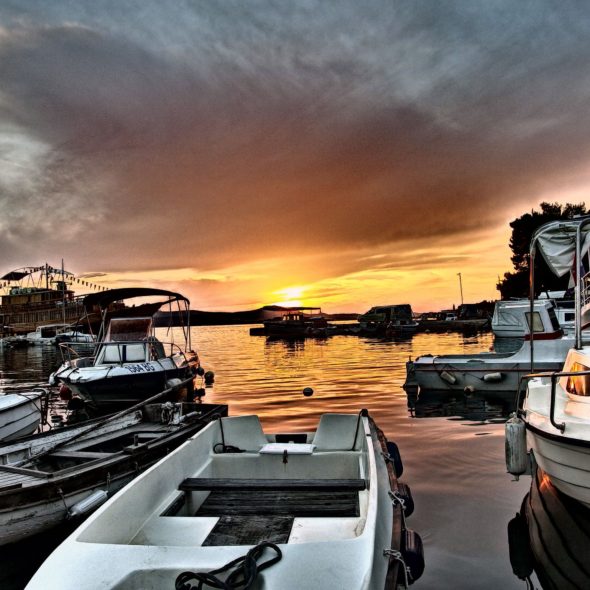 Sunset And Boats