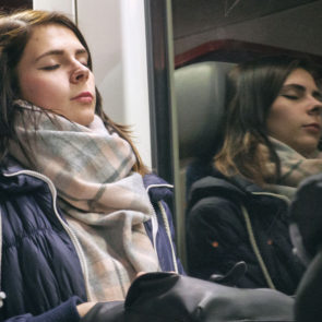 Beautiful girl sleeping in the train
