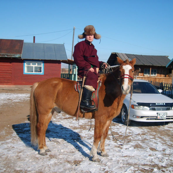 Mongolian man and horse