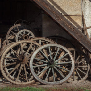Wooden Wagon Wheels On Farm