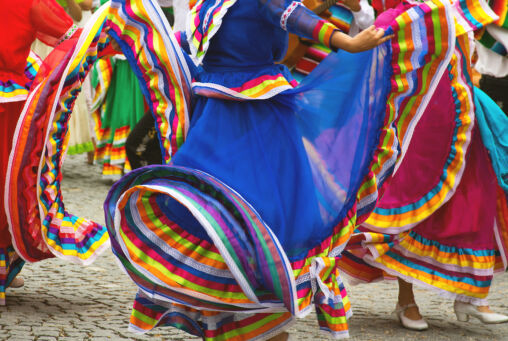 A dancers in a colorful dress