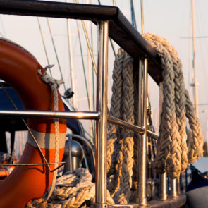 Railing, rope and lifebuoy on yacht
