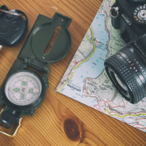 Travel Map, Car Key, Compass And Camera