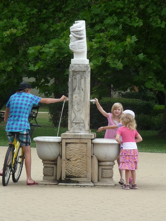 fountain, cyclists, children