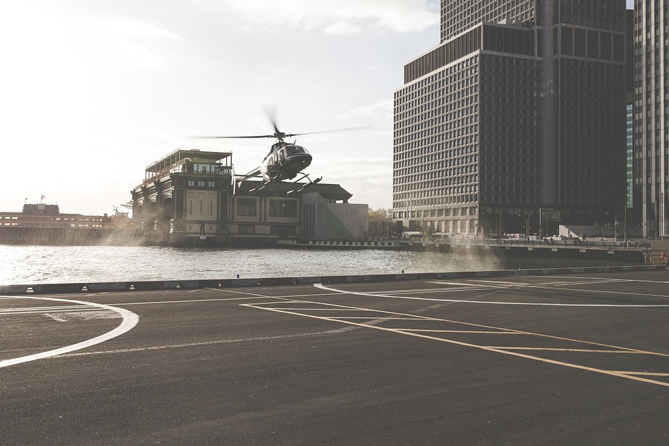 helicopter, helipad, pavement