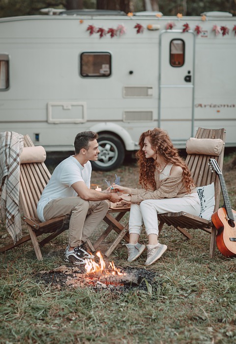 couple, camping, trailer