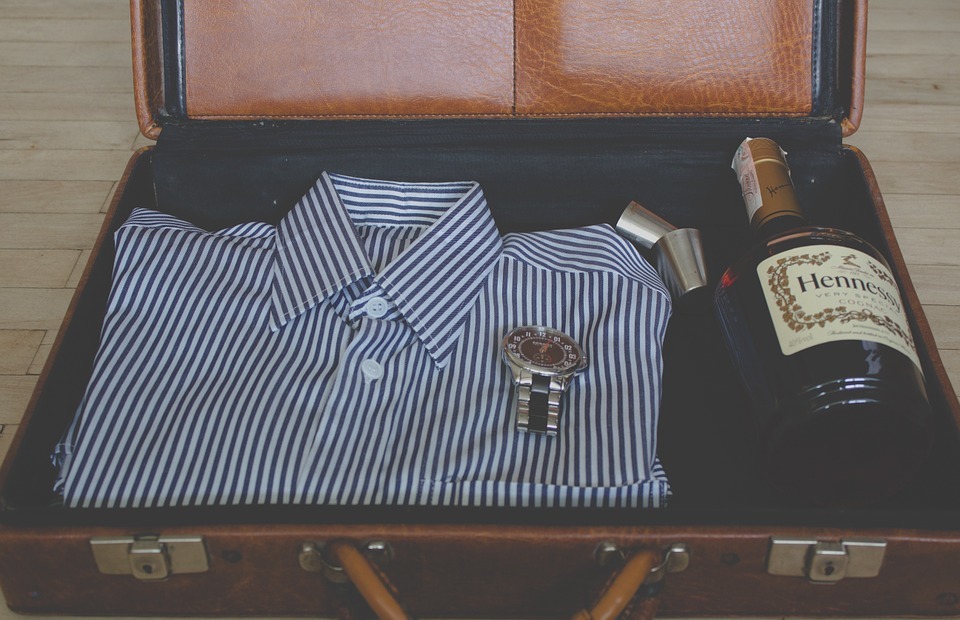 suitcase, shirt, wine