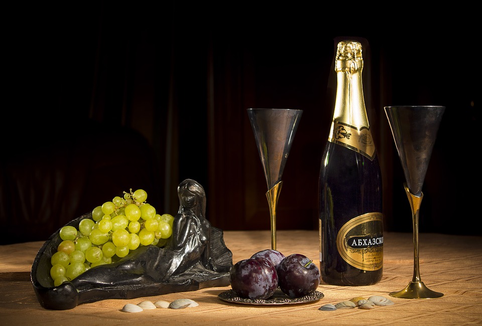 champagne, wine glasses, grapes