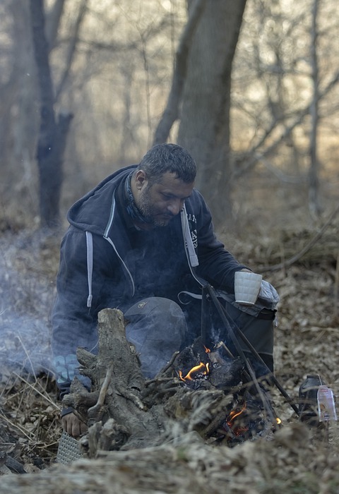 iranian man, campfire, camping