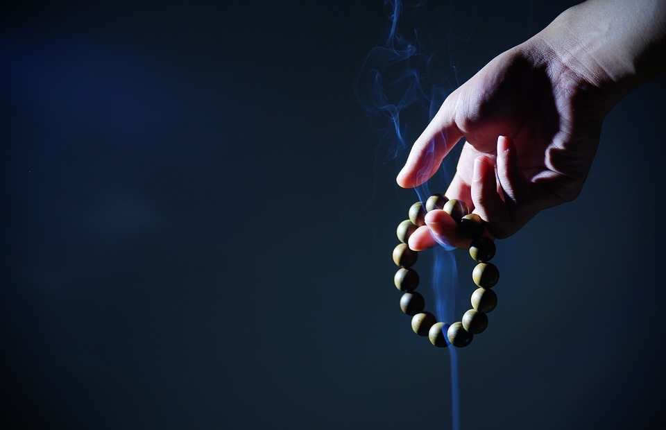 hand, buddhist prayer beads, smoke