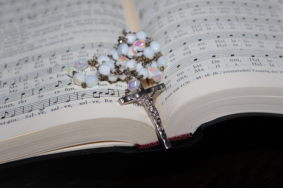 rosary, prayer book, hymnal