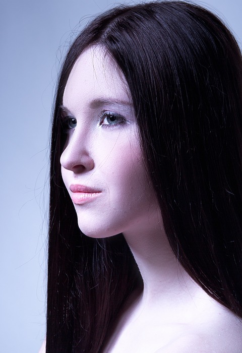mystical portrait of a girl, eyes, black background