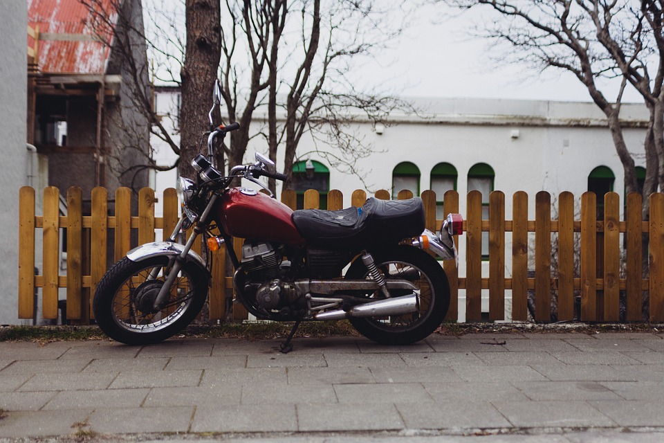 motorcycle, motorbike, picket fence