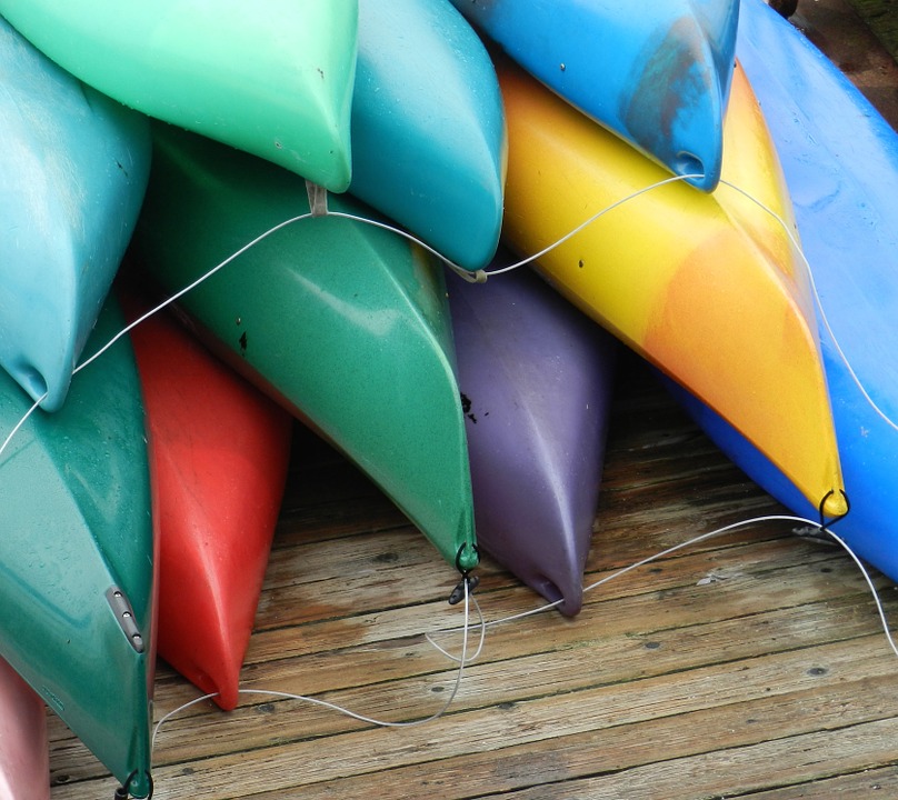 kayaks, boats, colorful