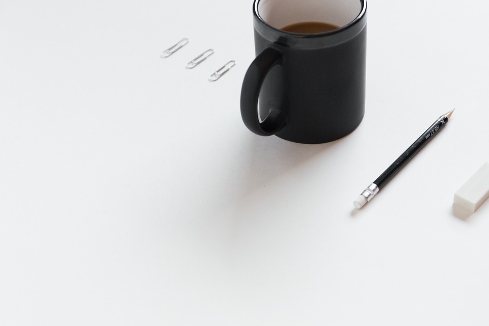 coffee mug, pencil, eraser