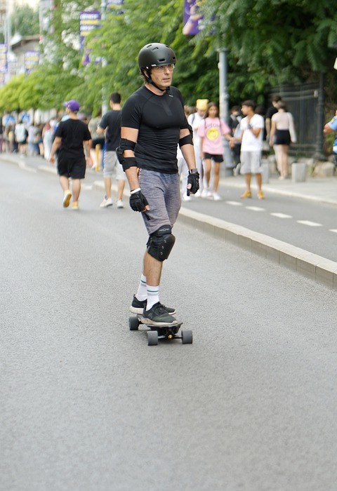 man, skateboard, road