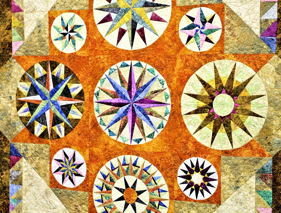 prize winning quilt, circular star designs, sewing