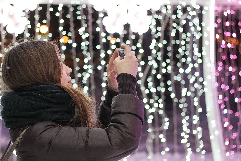 selfie, lights background, female