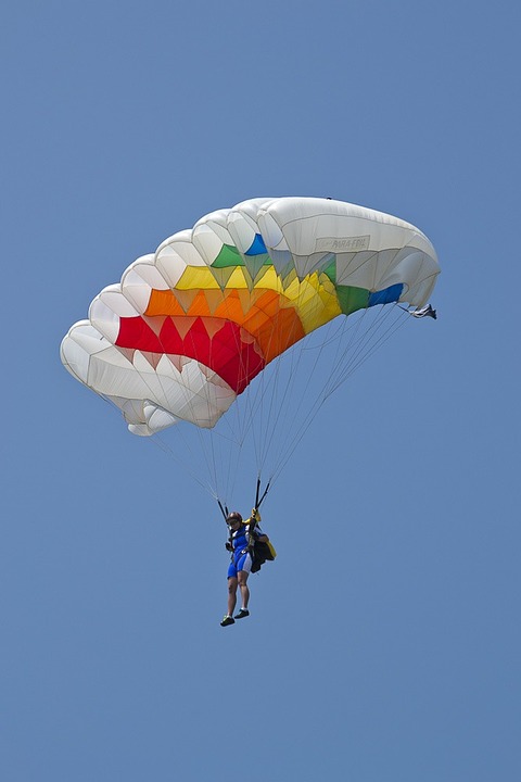 parachutist, parachute flies, parachute